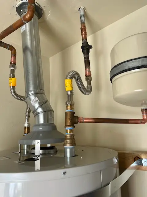 Water heater installation and plumbing repair in Holly Meadows